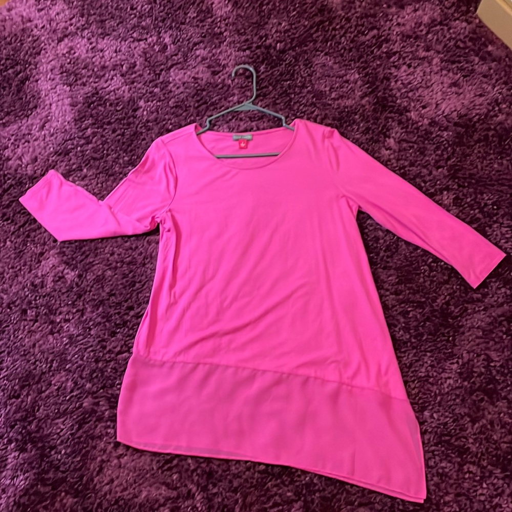 Vince Camuto, asymmetrical, three-quarter length sleeve.